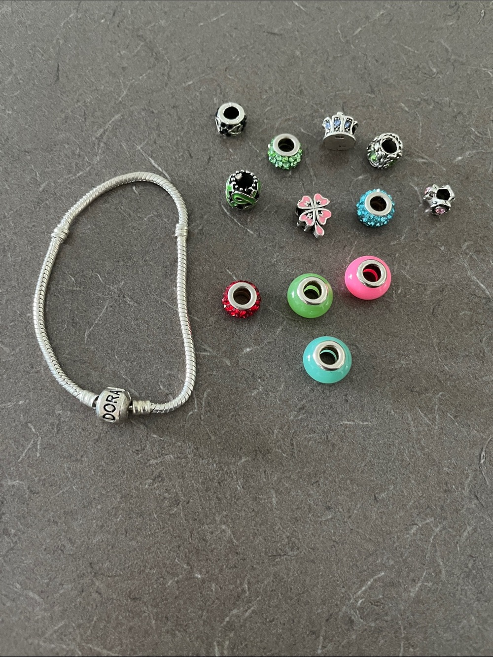 Pandora Silver Bracelet with some charms.